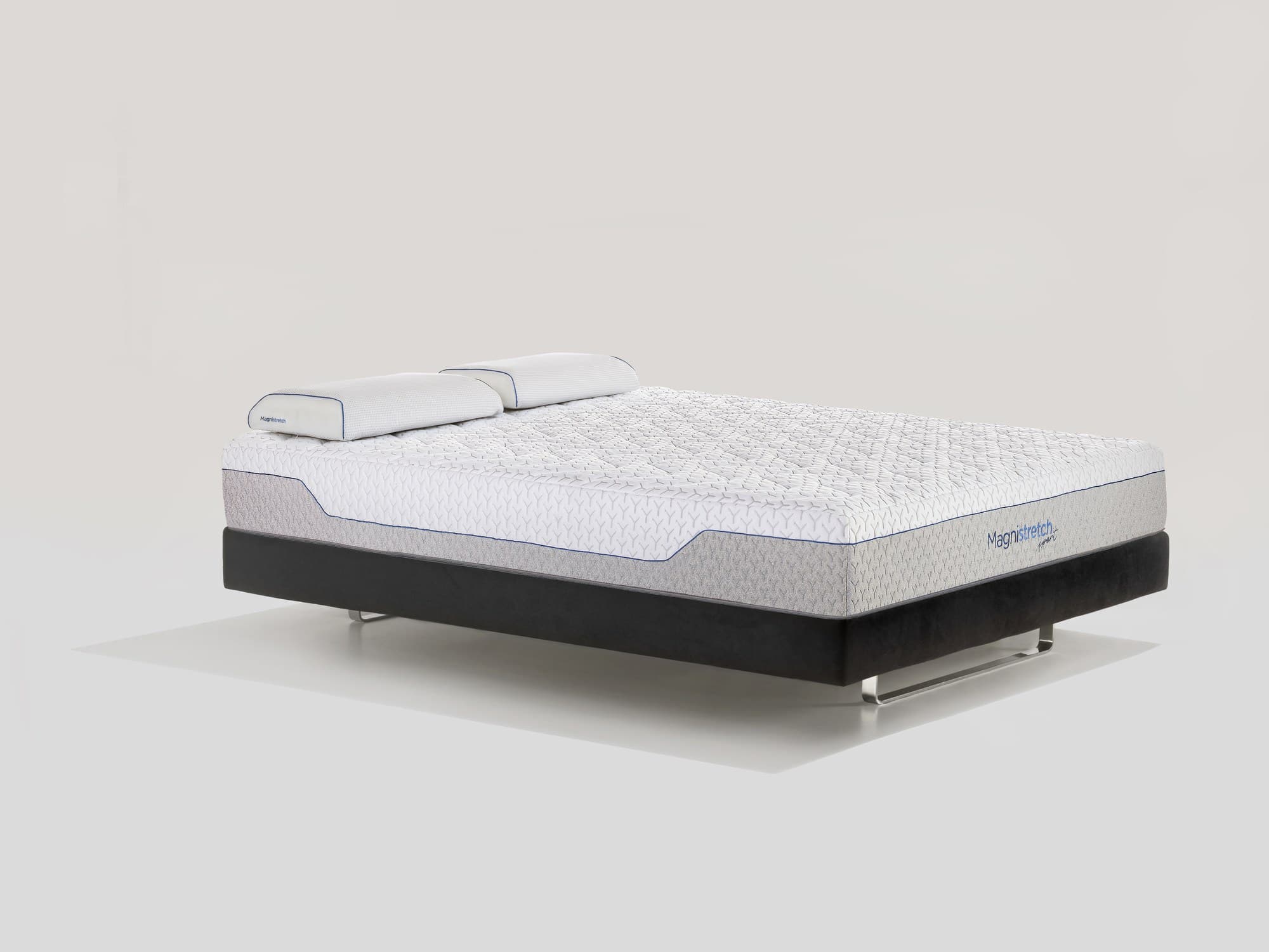 Materasso MagniStretch Sport 9, vista laterale con guanciali